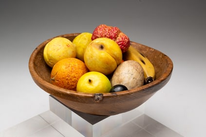 TURNED WOOD BOWL WITH MINIATURE STONE FRUIT.