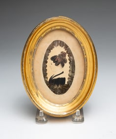 MINIATURE WATERCOLOR PORTRAIT OF A YOUNG WOMAN.