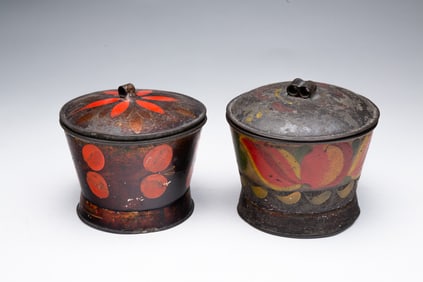 TWO TOLE LIDDED SUGAR BOWLS.