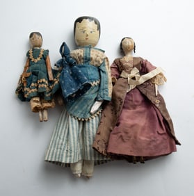 THREE WOODEN PEG DOLLS.
