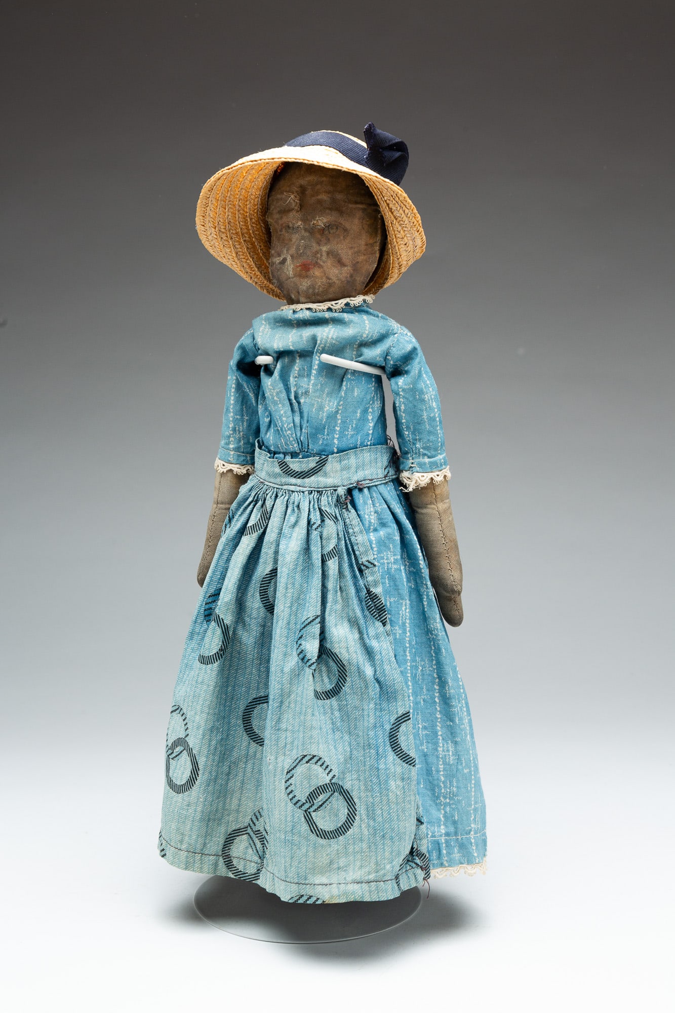 CLOTH DOLL WITH PAINTED FACE. (1 of 4)