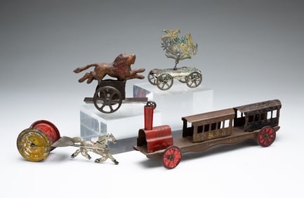 FOUR PRESSED TIN AND PAINTED PULL TOYS.