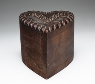CARVED WOODEN HEART BANK.