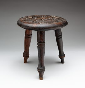 DIMINUTIVE CHIP CARVED FOOT STOOL.