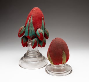 TWO FOLK ART STRAWBERRY MAKE-DO PINCUSHIONS.