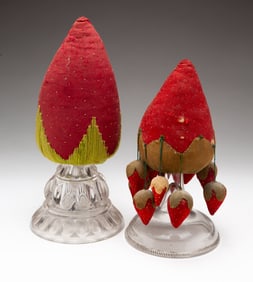 TWO FOLK ART STRAWBERRY MAKE-DO PINCUSHIONS.