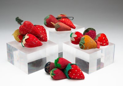 FIFTEEN MINIATURE STRAWBERRY PINCUSHIONS.
