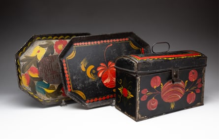 A TOLE DOME TOP DOCUMENT BOX AND TWO TOLE TRAYS.