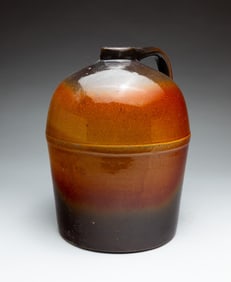 GLAZED STONEWARE WHISKEY JUG.