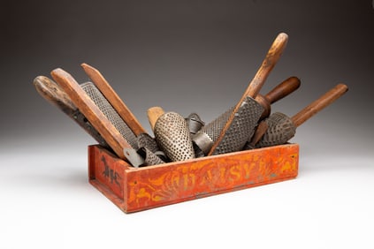 DAISY WAGON BED AND A COLLECTION OF GRATERS.