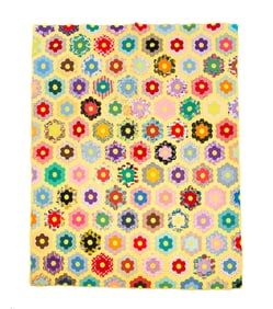 PIECED HONEYCOMB PATTERN QUILT.
