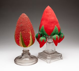 TWO FOLK ART STRAWBERRY MAKE-DO PINCUSHIONS.