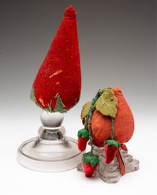 TWO FOLK ART STRAWBERRY MAKE-DO PINCUSHIONS.