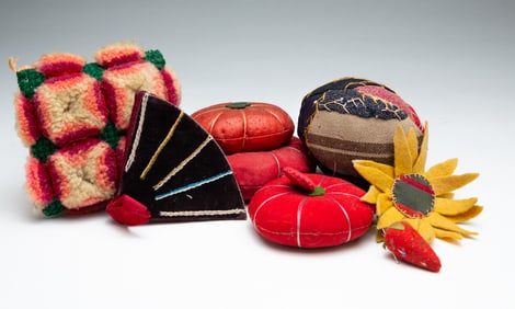 SEVEN PINCUSHIONS.