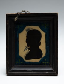 HOLLOW CUT SILHOUETTE OF A GENTLEMAN.