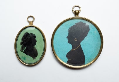 TWO PAINTED SILHOUETTES.