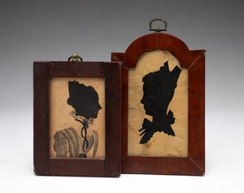 TWO HOLLOW CUT SILHOUETTES OF LADIES.