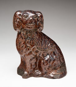 OHIO SEWER TILE SEATED SPANIEL DOG.
