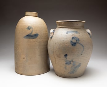 AN OHIO STONEWARE "PACKER" JAR AND AN UNMARKED JUG.