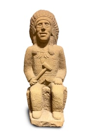 CARVED FOLK ART SANDSTONE SEATED INDIAN CHIEF BY ERNEST "POPEYE" REED (OHIO, 1919-1985).