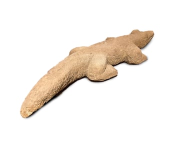 CARVED FOLK ART STONE ALLIGATOR BY ERNEST "POPEYE" REED (OHIO, 1919-1985).