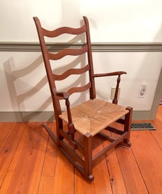 PUTNAM FAMILY CHIPPENDALE ROCKING ARMCHAIR.