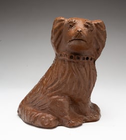 OHIO SEWER TILE SEATED SPANIEL DOG.