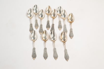 TWELVE CINCINNATI TWIST HANDLE COIN SILVER SPOONS SIGNED C. OSKAMP.