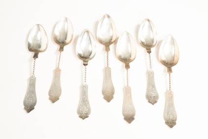 SEVEN CINCINNATI TWIST HANDLE COIN SILVER SPOONS.