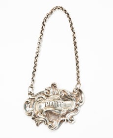 GEORGE III ENGLISH SILVER "PORT" BOTTLE LABEL BY PAUL STORR (1770-1844).