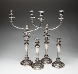 SET OF FOUR GEORGE III ENGLISH SHEFFIELD SILVER PLATE CANDLESTICKS BY MATTHEW BOULTON (1728-1809).