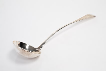GEORGIAN STERLING SILVER LADLE BY ADAM GRAHAM.
