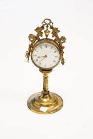 ENGRAVED CANDLESTICK CLOCK WITH FUSEE WATCH MOVEMENT.