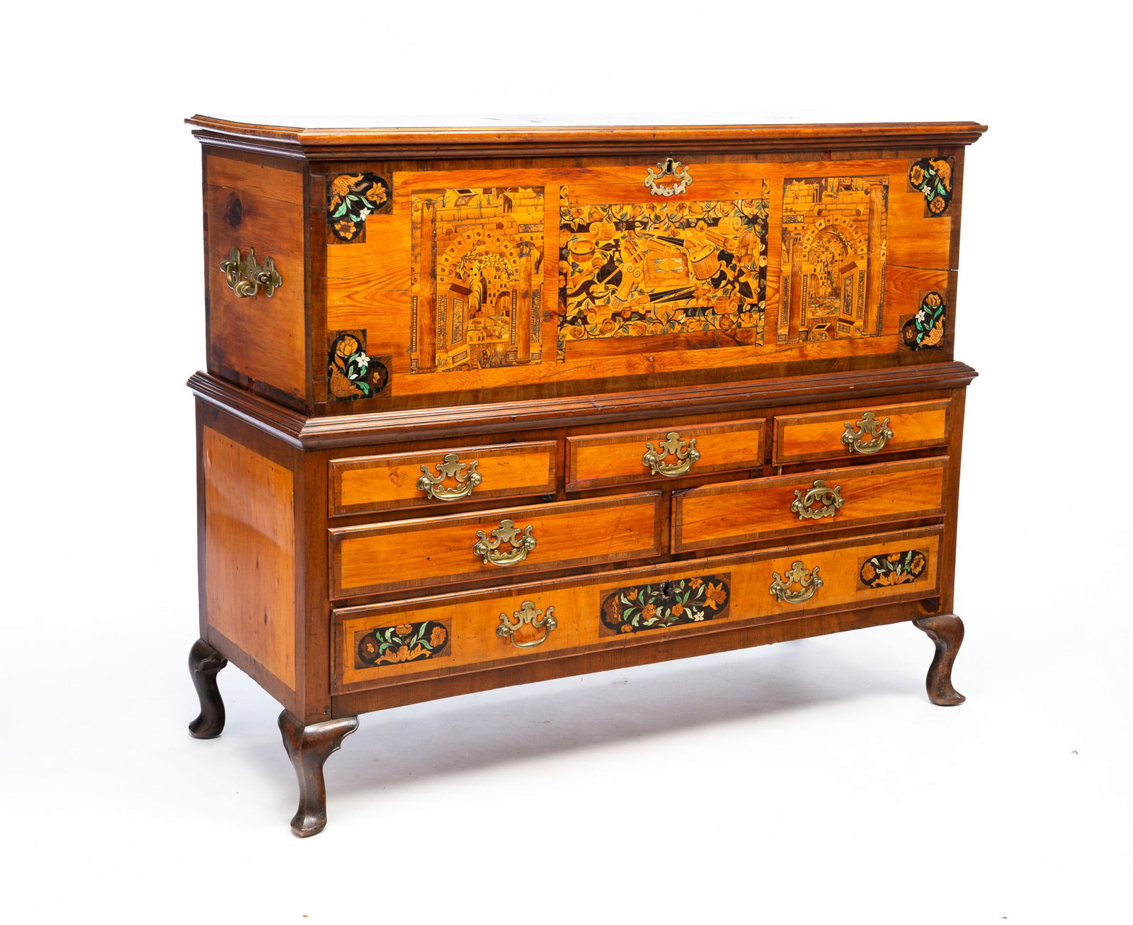 QUEEN ANNE MARQUETRY COFFER ON CHEST.: Europe, 18th Century. Pine and walnut with pewter, sapwood, and bone inlay. Coffer lid has applied edge molding, dovetailed case, and banded inlay. Lid with three inked floral panels and pewter monogr