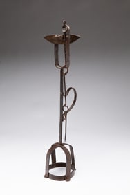 EARLY AND UNUSUAL GREASE LAMP ON CROWN-FORM MOUNTING BASE.