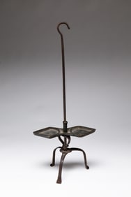 EARLY TABLE-TOP OR HANGING IRON CANDLE STANDARD.
