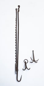A TRAMMEL AND TWO MINIATURE MEAT OR HERB HOOKS.