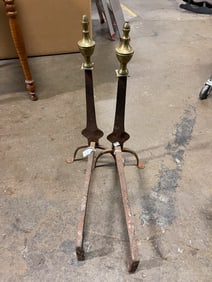 A PAIR OF KNIFE BLADE ANDIRONS.