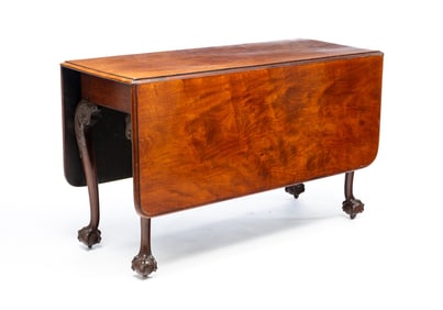 MAHOGANY CHIPPENDALE SWING LEG DROP LEAF TABLE.