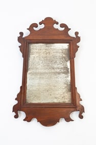 DIMINUTIVE SCROLL CUT MIRROR.