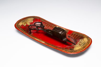 RED PAINTED TOLE SNUFFER TRAY WITH CANDLE TRIMMERS.