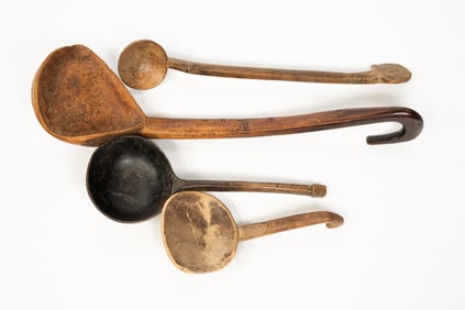 GROUP OF FOUR CARVED LADLES / DIPPERS.