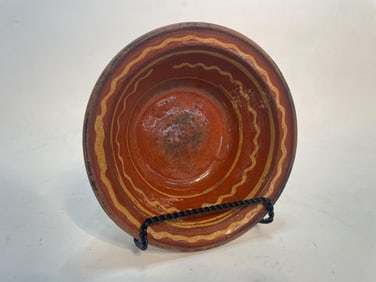 SLIP DECORATED REDWARE BOWL.