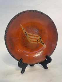 SLIP DECORATED REDWARE PLATE.