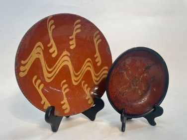 SLIP DECORATED REDWARE PLATE AND SHALLOW BOWL.