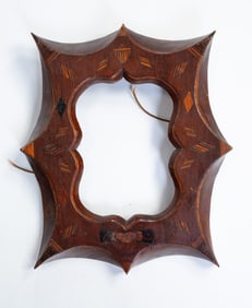 INLAID FOLK ART FRAME WITH MASONIC MOTIF AND SHIELD.