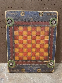 CARVED AND PAINT DECORATED GAMEBOARD.