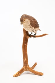 CARVED AND PAINTED HAWK ON BRANCH.