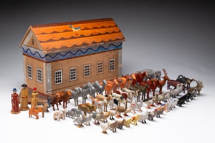 FOLK ART PAINTED NOAH'S ARK WITH CARVED AND PAINTED ANIMALS.