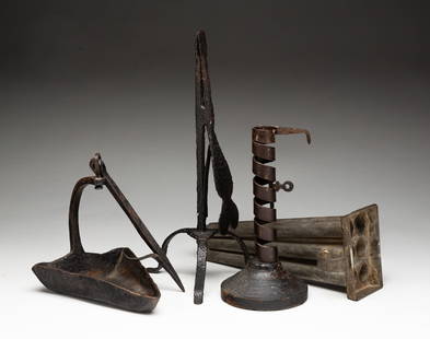 GROUP OF AMERICAN WROUGHT IRON AND TIN LIGHTING DEVICES.: American, 19th Century. A wrought iron triangular grease lamp, 6"h. A tin six-candle mold with homespun wicking, 9.5"l. A courting candlestick with painted wood base, 7.5"h. And a wrought iron rush